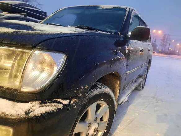 2004 Toyota Land Cruiser 100 Series Рестайлинг 1, чёрный, 1400000 рублей - вид 2