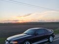 1996 Ford Mustang IV, фиолетовый - вид 1