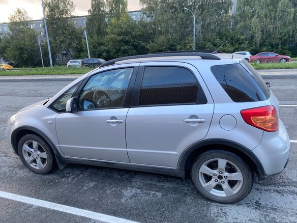 2011 Suzuki SX4 I (Classic) Рестайлинг, серебристый - вид 3