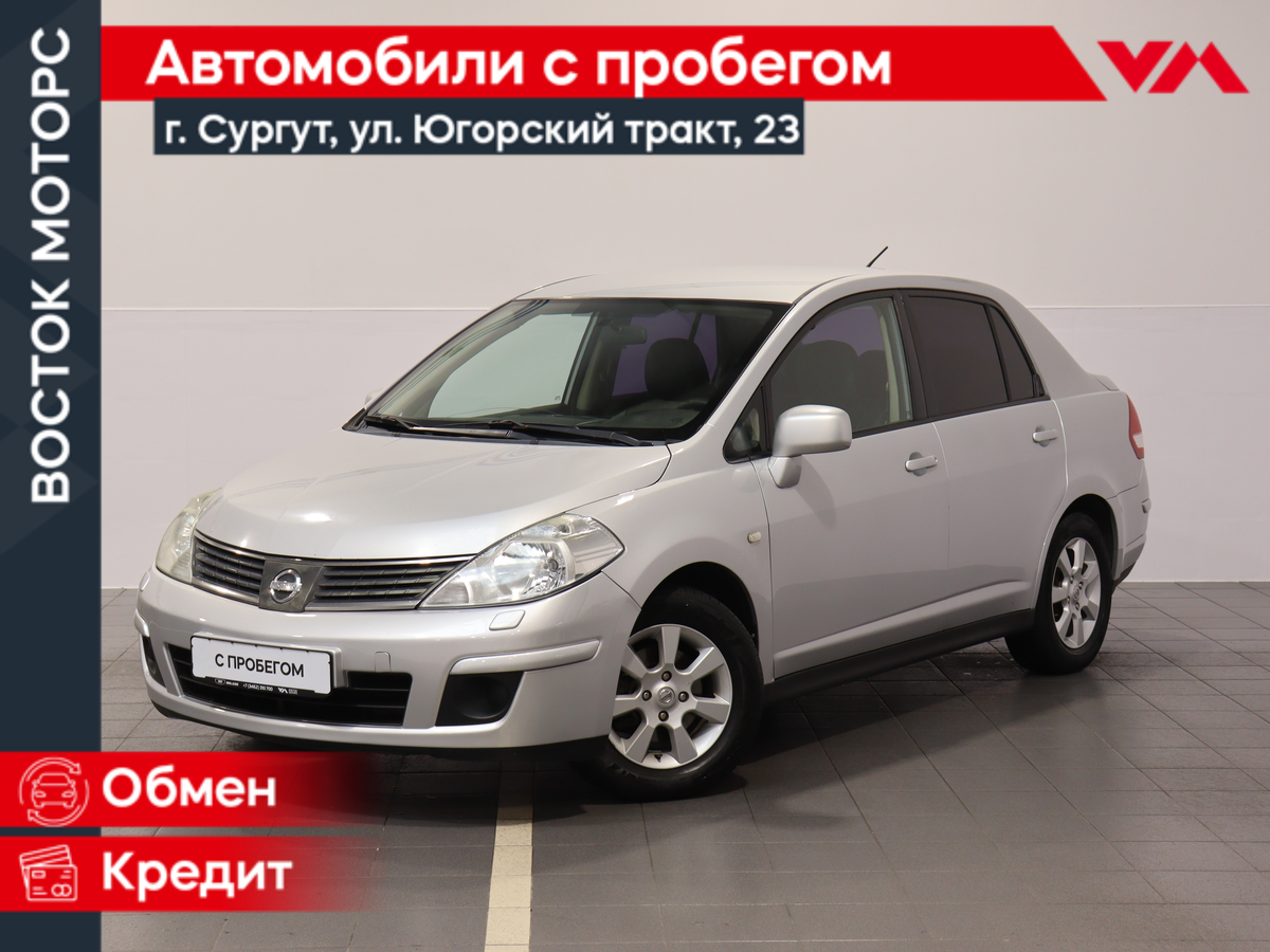 Открыть фотографии: Nissan Tiida I