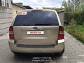 2009 Kia Carnival Grand II, золотистый, 1200000 рублей - вид 5