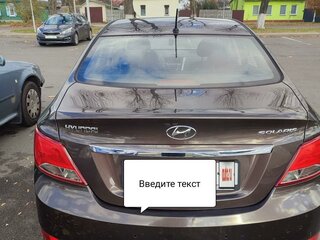 2014 Hyundai Solaris I Рестайлинг, коричневый, 975499 рублей, вид 3