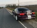 1996 Ford Mustang IV, фиолетовый - вид 3