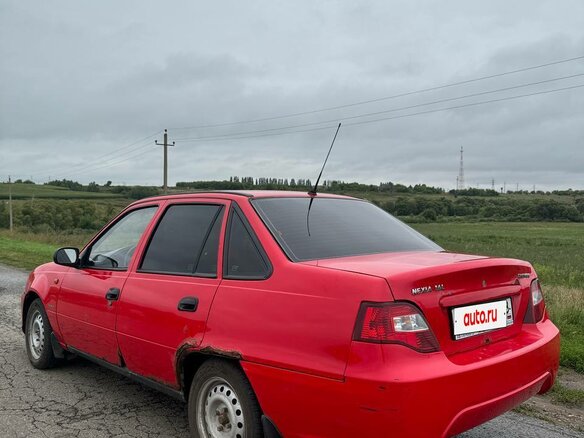 2011 Daewoo Nexia I Рестайлинг, красный, 140000 рублей - вид 2