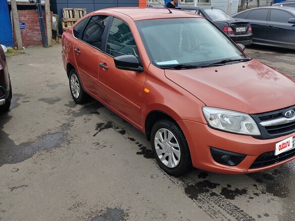 2015 Lada (ВАЗ) Granta I, оранжевый, 600000 рублей - вид 1