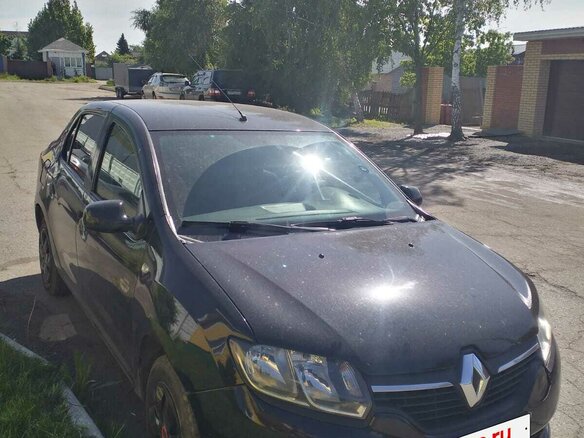 2016 Renault Logan II, чёрный, 580000 рублей - вид 1
