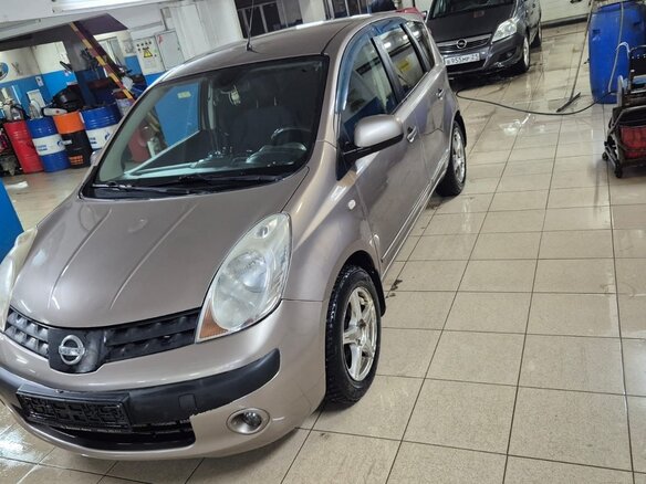 2007 Nissan Note I, коричневый, 640000 рублей - вид 2