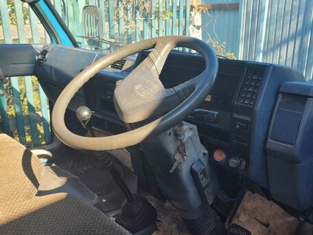 1987 Isuzu Elf (N-series), синий, 400000 рублей, вид 1