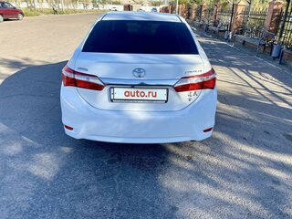 2014 Toyota Corolla XI (E160, E170, E180), белый, 1200000 рублей, вид 4
