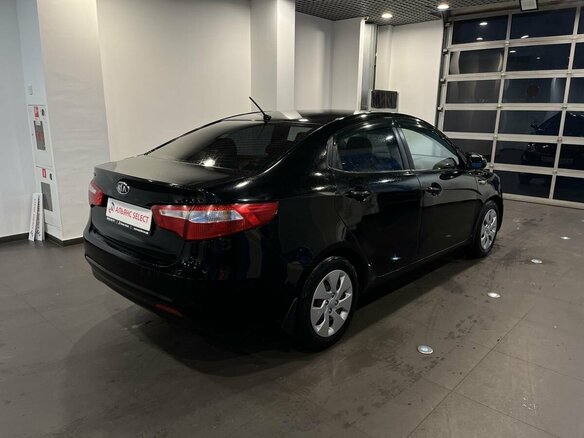 2012 Kia Rio 4-speed III, чёрный - вид 2