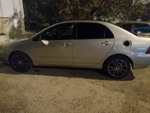 2001 Toyota Corolla IX (E120, E130), серый, 350000 рублей - вид 2