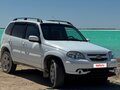 2012 Chevrolet Niva I Рестайлинг, белый, 570000 рублей - вид 4