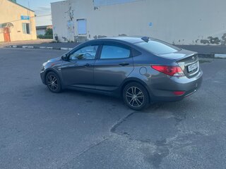 2012 Hyundai Solaris I, чёрный, 850000 рублей, вид 2