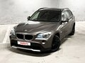 2011 BMW X1 18i I (E84), коричневый, 1390000 рублей - вид 5