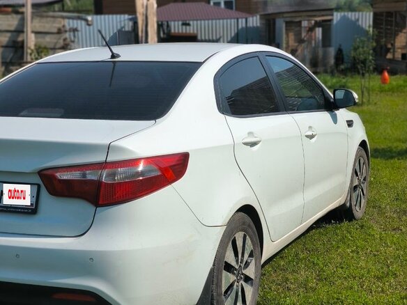 2012 Kia Rio 4-speed III, белый, 875000 рублей - вид 4