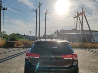 2015 Kia Rio 6-speed III, коричневый, 970000 рублей, вид 3