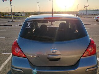 2010 Nissan Tiida I Рестайлинг, серый, 610000 рублей, вид 3