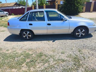 2012 Daewoo Nexia I Рестайлинг, серебристый, 220000 рублей, вид 4