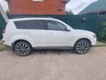 2011 Mitsubishi Outlander II Рестайлинг, белый, 1200000 рублей - вид 4
