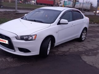 2014 Mitsubishi Lancer X Рестайлинг, белый, 800000 рублей, вид 1