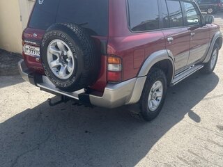 1999 Nissan Patrol V (Y61), красный, 1750000 рублей, вид 2