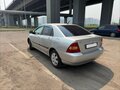 2004 Toyota Corolla IX (E120, E130), серебристый, 510000 рублей - вид 2