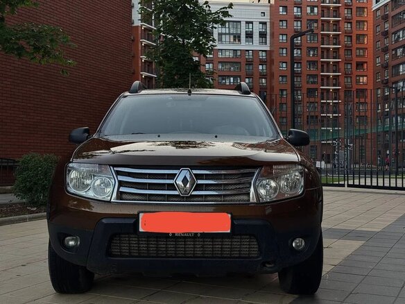 2013 Renault Duster I, коричневый, 780000 рублей - вид 1