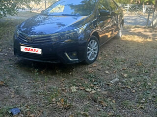 2013 Toyota Corolla XI (E160, E170, E180), чёрный, 1300000 рублей, вид 2