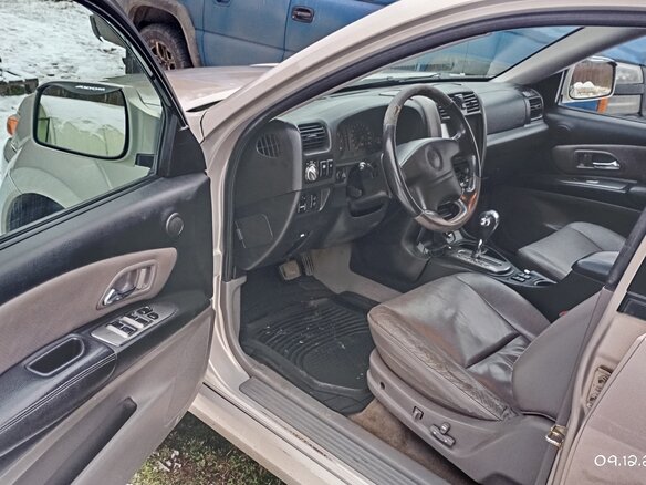 2002 Isuzu Axiom, серый, 720000 рублей - вид 5