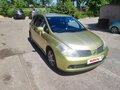 2005 Nissan Tiida I, жёлтый, 340000 рублей - вид 8