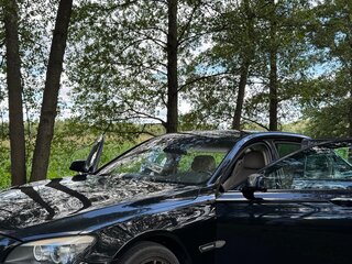 2009 BMW 7 серии Long 740Li V (F01/F02/F04), чёрный, 1200000 рублей, вид 4