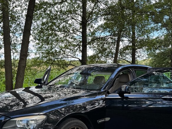 2009 BMW 7 серии Long 740Li V (F01/F02/F04), чёрный, 1200000 рублей - вид 3