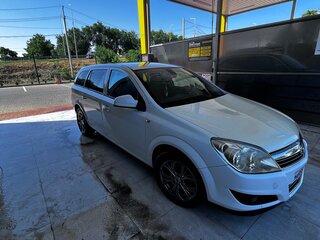 2010 Opel Astra H Рестайлинг, белый, 650000 рублей, вид 2