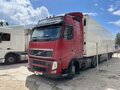 2011 Volvo FH, пурпурный, 5500000 рублей - вид 1