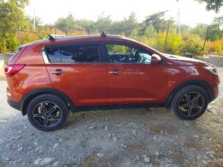2012 Kia Sportage III, оранжевый, 1150000 рублей, вид 2