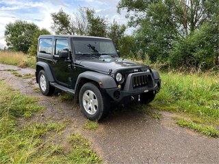 2011 Jeep Wrangler III (JK), чёрный, 3600000 рублей, вид 5