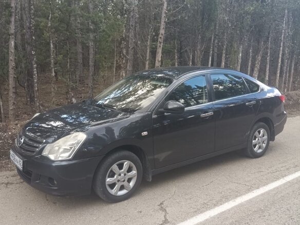 2014 Nissan Almera III (G15), чёрный, 530000 рублей - вид 1