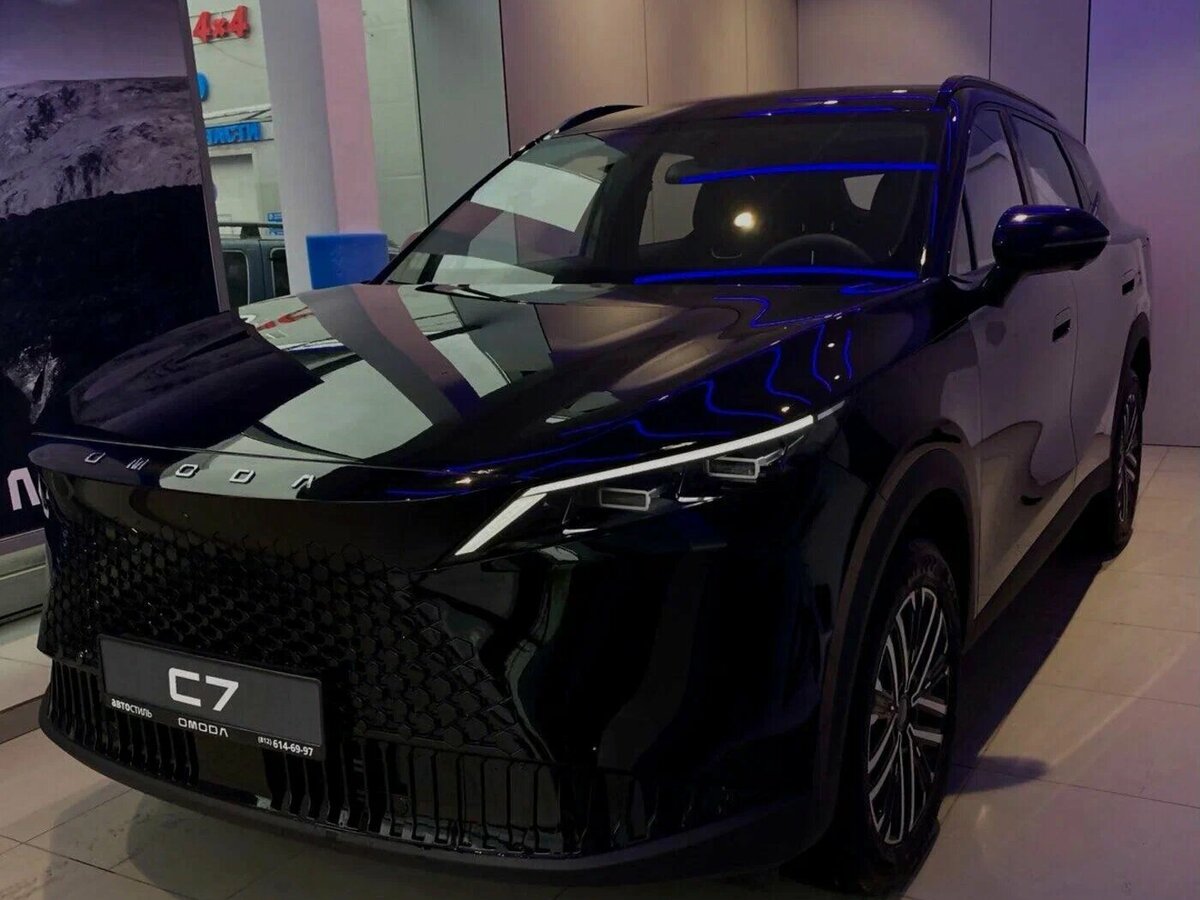 Открыть фотографии: Omoda C7