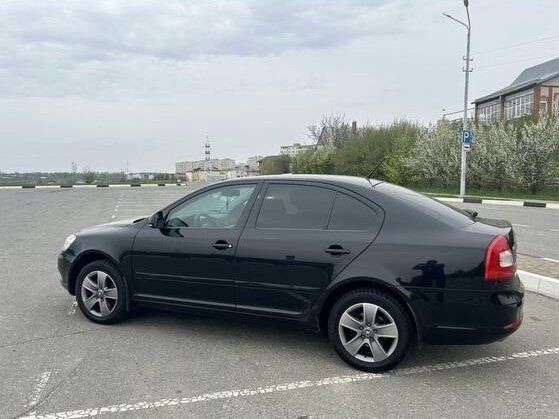 2012 Skoda Octavia II (A5) Рестайлинг, чёрный, 730000 рублей
