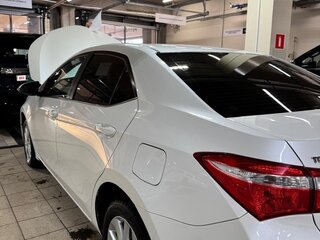 2013 Toyota Corolla XI (E160, E170, E180), белый, 1550000 рублей, вид 2