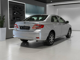 2011 Toyota Corolla X (E140, E150) Рестайлинг, серебристый, 845000 рублей, вид 4