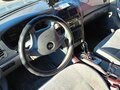 2004 Kia Magentis I Рестайлинг, серебристый, 270000 рублей - вид 4