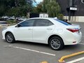 2018 Toyota Corolla XI (E160, E170, E180) Рестайлинг 1, белый - вид 3