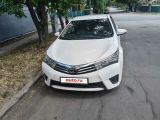 2014 Toyota Corolla XI (E160, E170, E180), белый, 1350000 рублей, вид 3