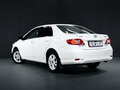 2013 Toyota Corolla X (E140, E150) Рестайлинг, белый - вид 4
