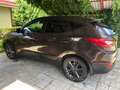 2015 Hyundai ix35 I Рестайлинг, коричневый - вид 4