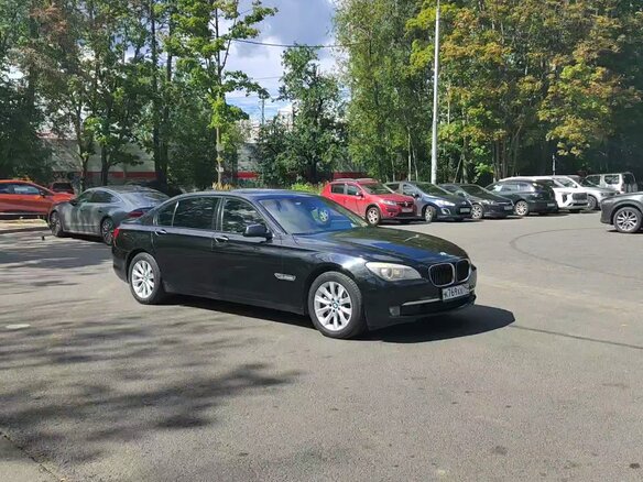2009 BMW 7 серии 730d V (F01/F02/F04), чёрный - вид 1
