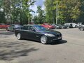 2009 BMW 7 серии 730d V (F01/F02/F04), чёрный - вид 1