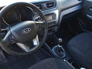 2012 Kia Rio 5-speed III, серый, 650000 рублей, вид 4