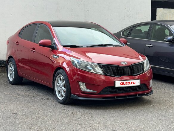 2011 Kia Rio III, красный